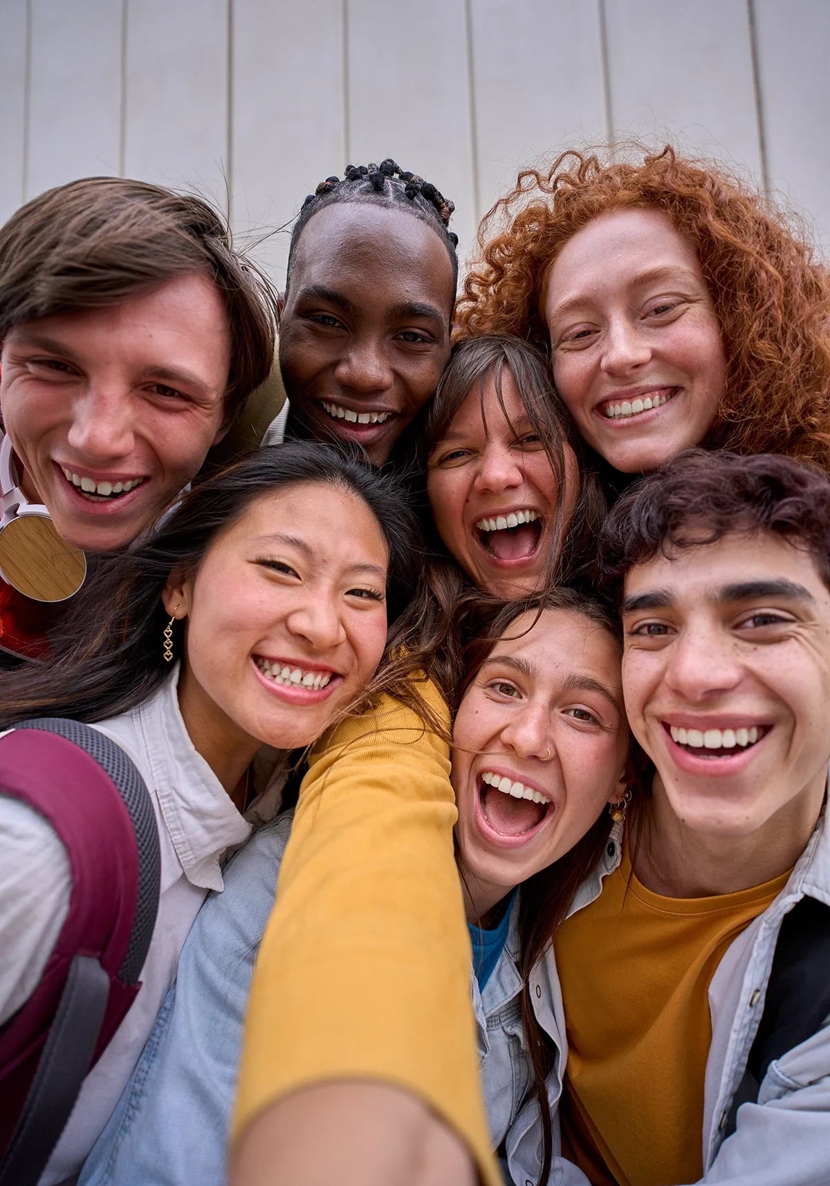 Teens laugh while hanging out at OASIS Ascent's Day Treatment Program
